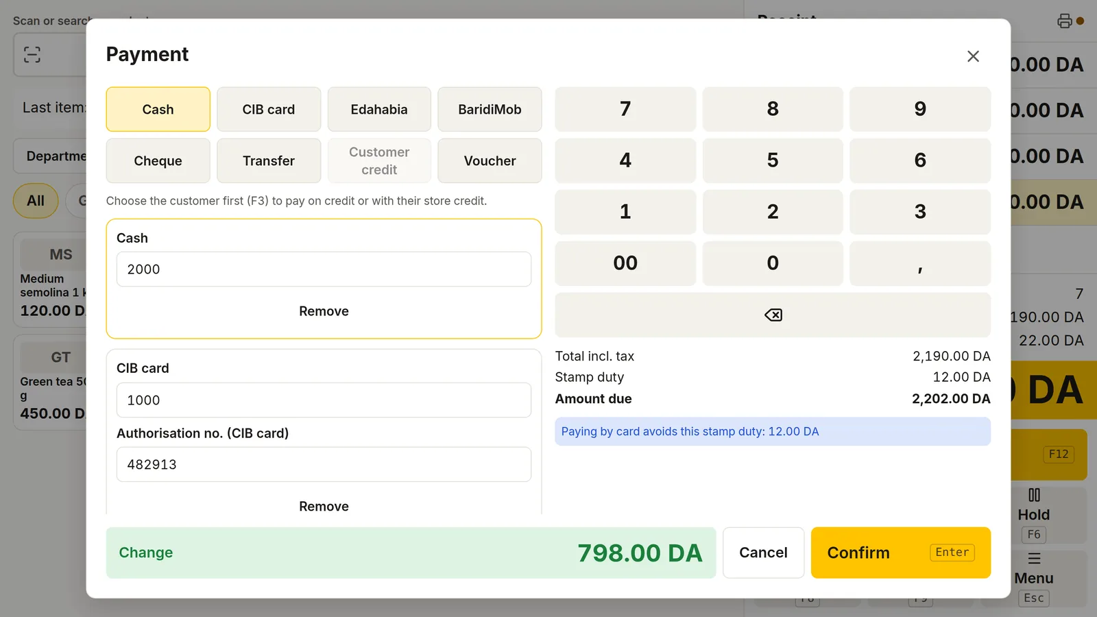 DZBuild POS payment window: part of the ticket paid by CIB card, stamp duty only on the cash part, and the hint that paying by card avoids the duty