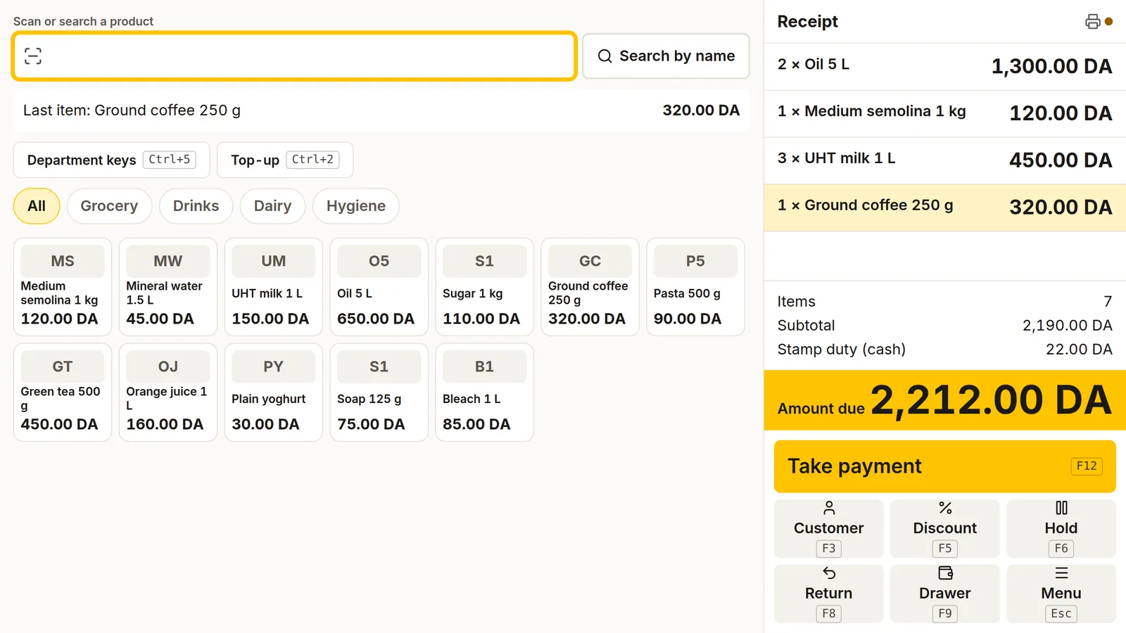 DZBuild POS sale screen in English with four lines on the ticket, a stamp duty line for cash and the amount due